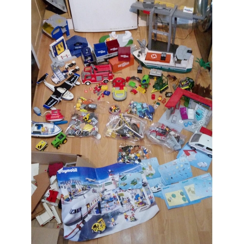 1201 - A Large Quantity of Playmobile Including Buildings, Vehicles, Characters and Much More.