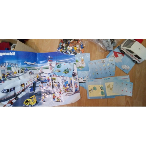 1201 - A Large Quantity of Playmobile Including Buildings, Vehicles, Characters and Much More.