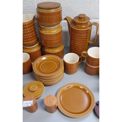 250 - Hornsea Saffron Dinner and Tea Service Items including:-
5 Storage Cannisters, Tea Pot, Coffee Pot, ... 