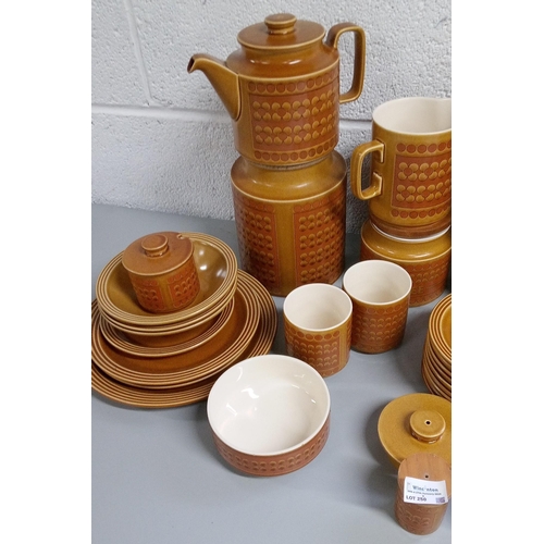 250 - Hornsea Saffron Dinner and Tea Service Items including:-
5 Storage Cannisters, Tea Pot, Coffee Pot, ... 