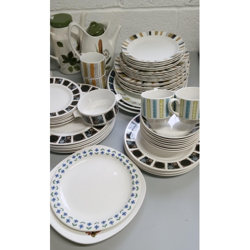 253 - A Large Lot of Mixed Mid Winter Crockery in assorted designs.