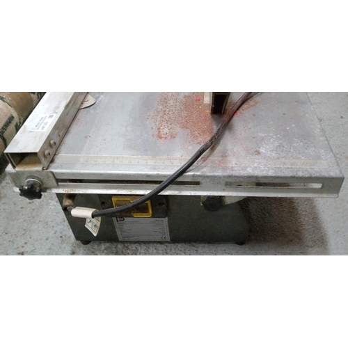 111 - An Electric Tile Cutter.