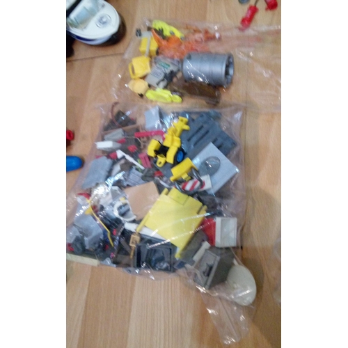 1201 - A Large Quantity of Playmobile Including Buildings, Vehicles, Characters and Much More.