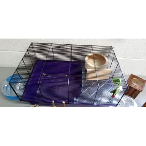 6 - A Rodent Cage with Lots of Accessories.