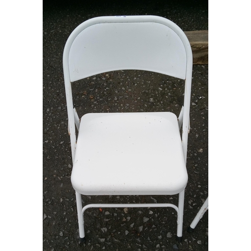 8 - 2 Metal Folding Chairs.