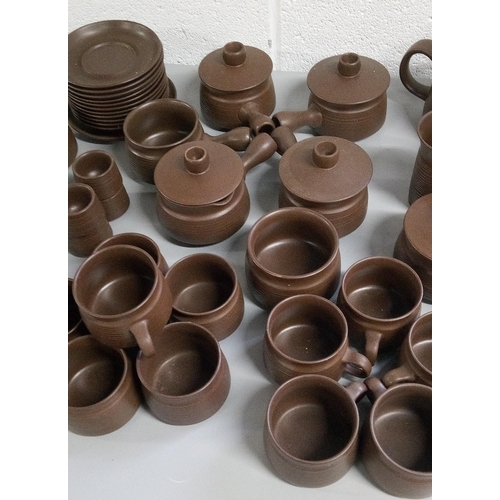 267 - A Selection of Denby Sherwood Crockery including:-
11 Side Plates, 8 Dinner Plates, 10 Cups, 3 Mugs,... 