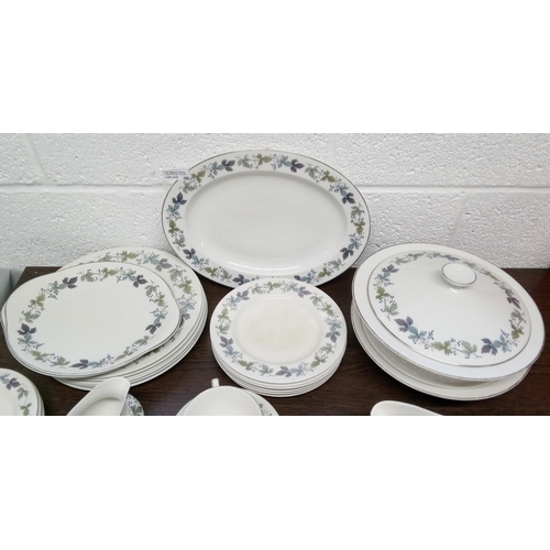 279 - A Part Royal Doulton Burgundy Dinner Service including:-
1 Large Oval Platter, 2 Cake Plates, 2 Lidd... 