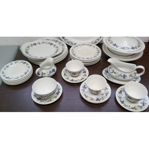 279 - A Part Royal Doulton Burgundy Dinner Service including:-
1 Large Oval Platter, 2 Cake Plates, 2 Lidd... 