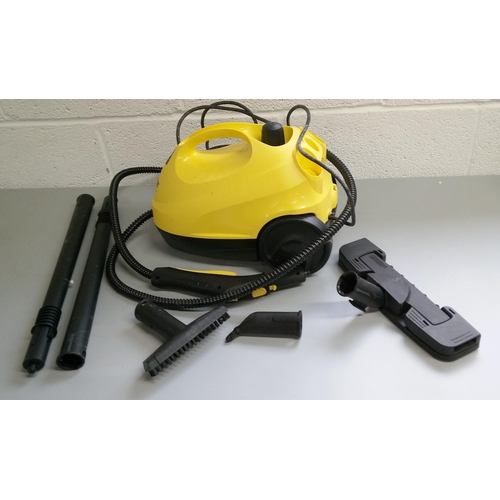 119 - A Karcher Steam Cleaning Station with Attachments and In Original Box.