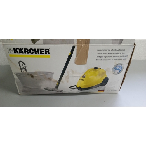 119 - A Karcher Steam Cleaning Station with Attachments and In Original Box.