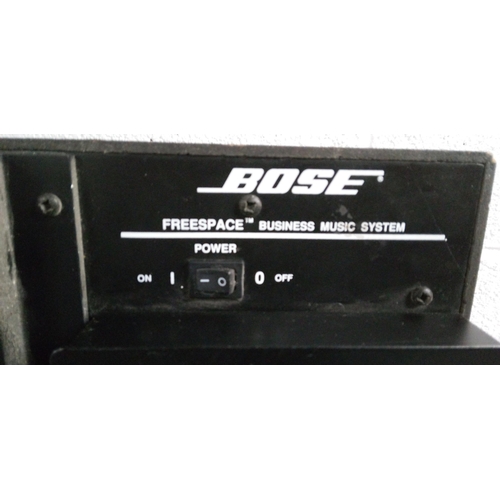 322 - A BOSE Freespace Business Music System with 2 Bose Direct/Reflecting 501 IV Speakers.