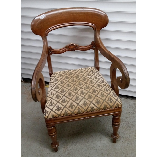 725 - Antique Scroll Chair with Carved Detailing. Needs attention to front leg, needs refixing.