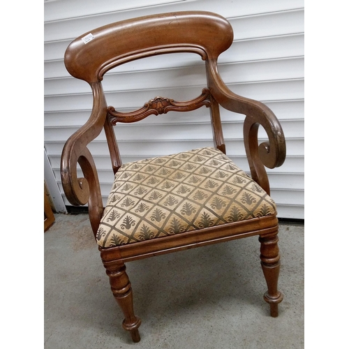 725 - Antique Scroll Chair with Carved Detailing. Needs attention to front leg, needs refixing.