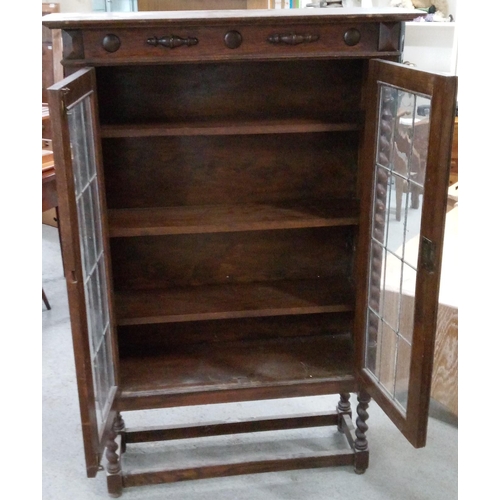 730 - An Antique Bookcase/Display Cabinet with Leaded Glass Doors, Turned Legs and 4 Shelves. 139cm H x 92... 