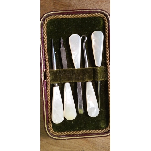 802 - An Antique Mother of Pearl Cased Sewing Set.