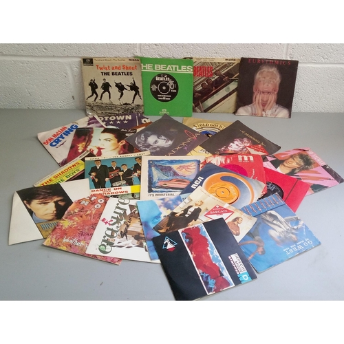 344 - A Large Selection of Singles including Rolling Stones, Beatles, Elvis and much more.