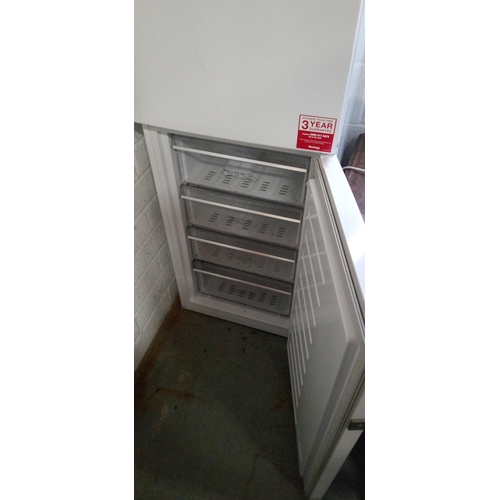 296 - A Bloomberg Fridge Freezer (Top Fridge) 180cm H x 54cm W x 55 cm D.