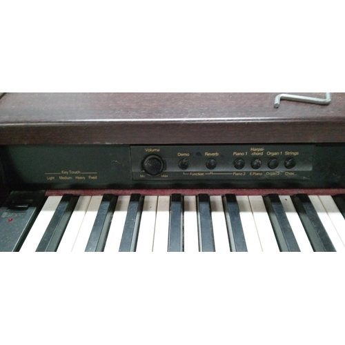 325 - A Roland HP-1 Digital Piano with Foot Pedals and Stool. 82cm H x 139cm W x 43cm D.