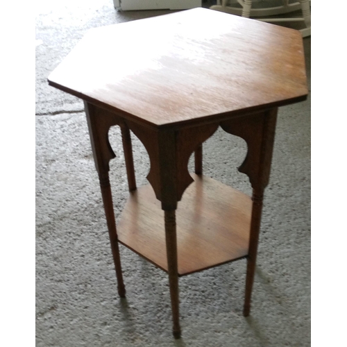 745 - A Gothic Style Hexagonal Table with Lower Shelf. 70cm H x 48cm W x 48cm D.