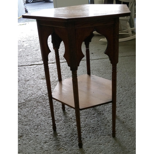 745 - A Gothic Style Hexagonal Table with Lower Shelf. 70cm H x 48cm W x 48cm D.