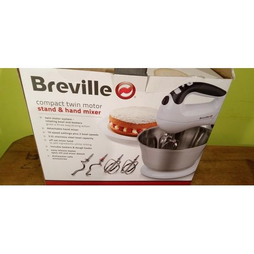 621 - A Breville Compact Twin Motor Stand and Hand Mixer in Original Packaging.