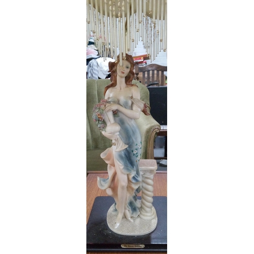 386 - A Lady Statue Table Lamp with Fringed Shade and a plaque with the 