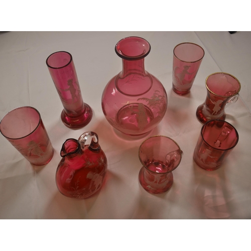 69 - A GROUP OF VICTORIAN CRANBERRY GLASS WARES, including eight pieces of Mary Gregory painted figure de... 