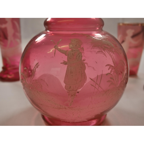 69 - A GROUP OF VICTORIAN CRANBERRY GLASS WARES, including eight pieces of Mary Gregory painted figure de... 