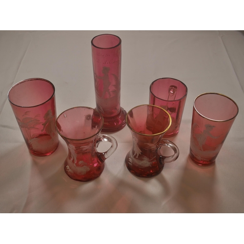 69 - A GROUP OF VICTORIAN CRANBERRY GLASS WARES, including eight pieces of Mary Gregory painted figure de... 