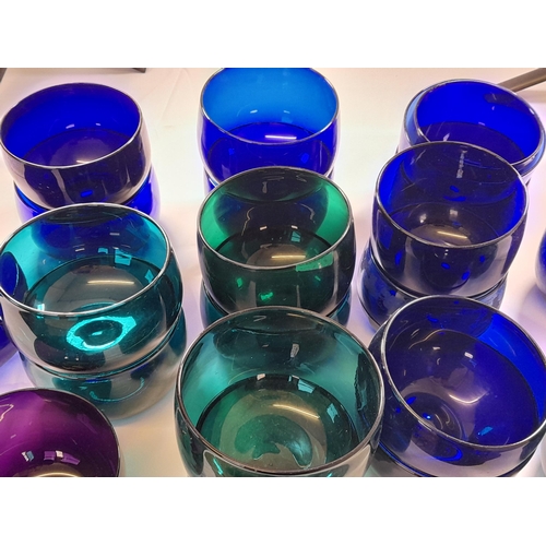 71 - A LARGE GROUP OF VINTAGE GLASS BOWLS, including emerald glass, amethyst glass and blue glass example... 