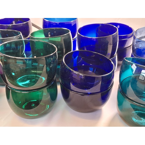 71 - A LARGE GROUP OF VINTAGE GLASS BOWLS, including emerald glass, amethyst glass and blue glass example... 