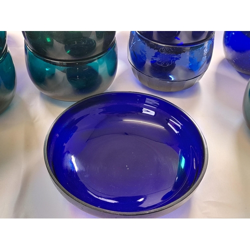 71 - A LARGE GROUP OF VINTAGE GLASS BOWLS, including emerald glass, amethyst glass and blue glass example... 