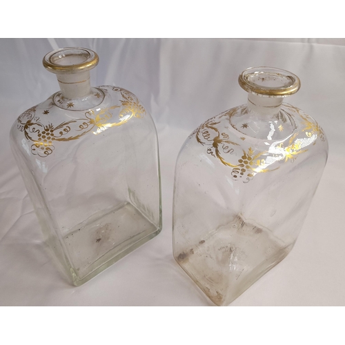 76 - A GROUP OF VARIOUS VINTAGE GLASS DECANTERS, including cut glass examples and gilded examples, some w... 