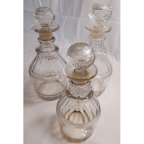 76 - A GROUP OF VARIOUS VINTAGE GLASS DECANTERS, including cut glass examples and gilded examples, some w... 