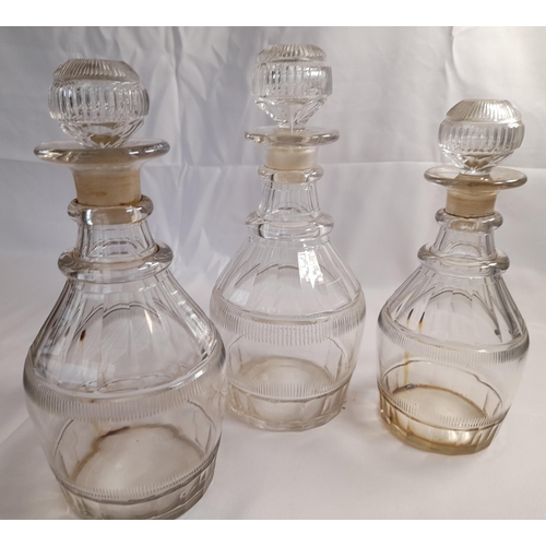 76 - A GROUP OF VARIOUS VINTAGE GLASS DECANTERS, including cut glass examples and gilded examples, some w... 