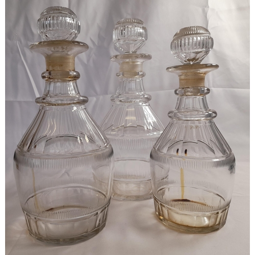 76 - A GROUP OF VARIOUS VINTAGE GLASS DECANTERS, including cut glass examples and gilded examples, some w... 