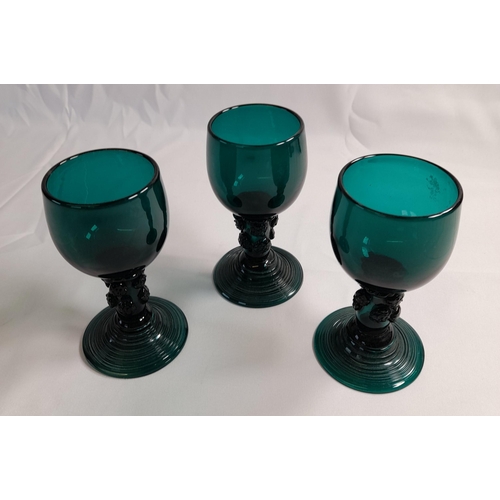 78 - A SELECTION OF TWELVE 19TH CENTURY EMERALD GLASSES, with conical and tapering bowls, some on knopped... 