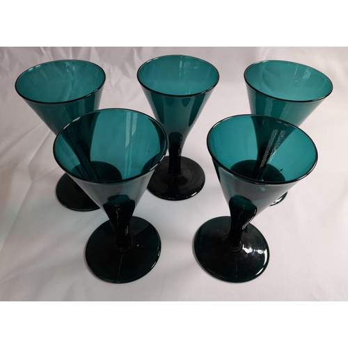 78 - A SELECTION OF TWELVE 19TH CENTURY EMERALD GLASSES, with conical and tapering bowls, some on knopped... 