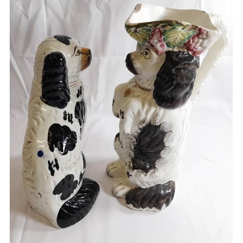 86 - A MID 19TH CENTURY STAFFORDSHIRE PITCHER, modelled as a spaniel wearing a tricorn hat, along with th... 