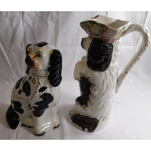 86 - A MID 19TH CENTURY STAFFORDSHIRE PITCHER, modelled as a spaniel wearing a tricorn hat, along with th... 