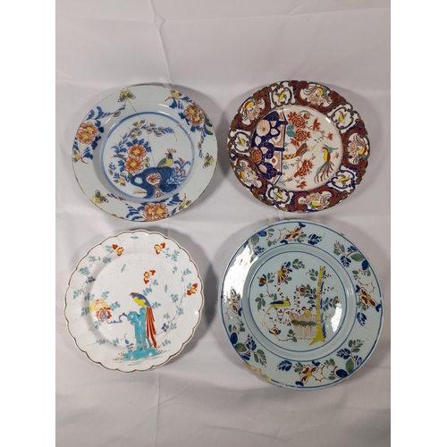 117 - TWO DELFT LATE 18TH/EARLY 19TH CENTURY POLYCHROME PLATES, decorated with birds and floral sprays, al... 