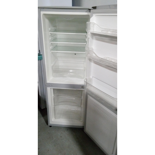 294 - A Naiko Fridge Freezer (Fridge at Top). 141cm H x 50cm x 60cm.