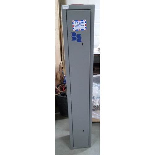 399 - A Metal Gun Safe with 2 keys. 121cm H x 21cm x 21cm.