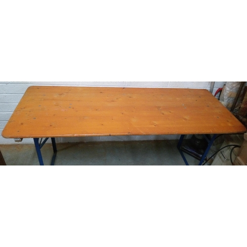 758 - A Folding Wooden Table with Metal Legs. 77cm H x 180cm L x 69cm W.