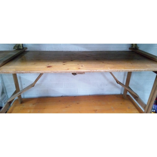 760 - A Folding Wooden Table. 73cm H x 180cm L x 67cm W.