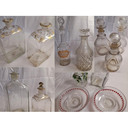 76 - A GROUP OF VARIOUS VINTAGE GLASS DECANTERS, including cut glass examples and gilded examples, some w... 