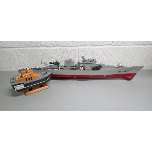 1231 - 2 Model Boats. 1 Life Boat with Remote. 1 Naval Boat with No Remote.