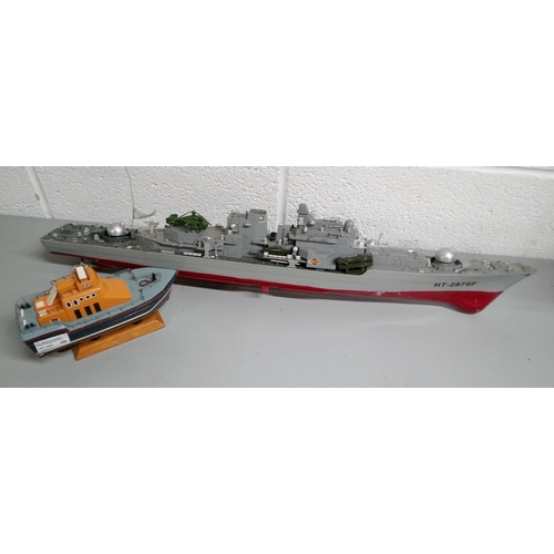 1231 - 2 Model Boats. 1 Life Boat with Remote. 1 Naval Boat with No Remote.