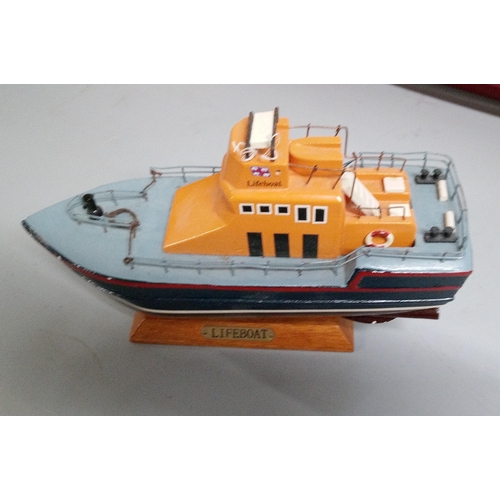 1231 - 2 Model Boats. 1 Life Boat with Remote. 1 Naval Boat with No Remote.