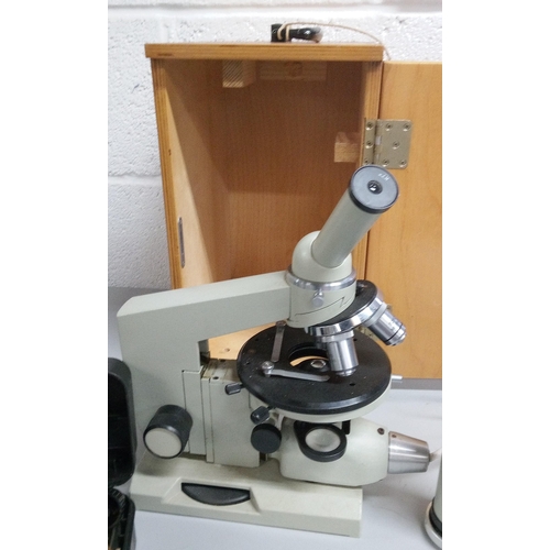 1232 - A Microscope in a Wooden Case.